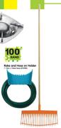 Rake And Hose On Holder